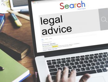 Person searching legal advice on Google