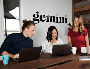 Gemini: Advanced Marketing Solutions employees working together